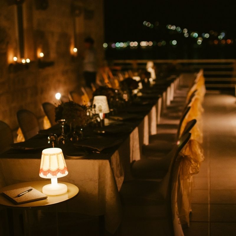 restaurant lit by candlelight